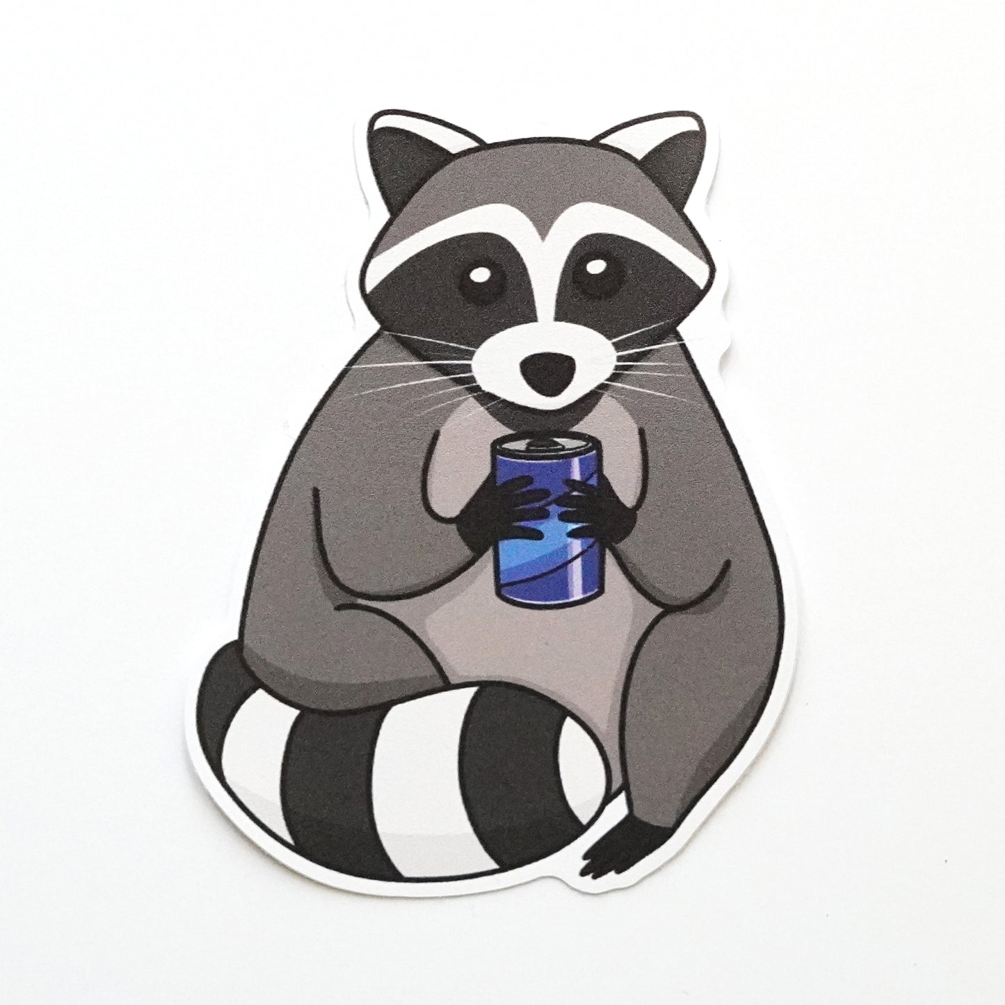 Raccoon Drinking Sticker